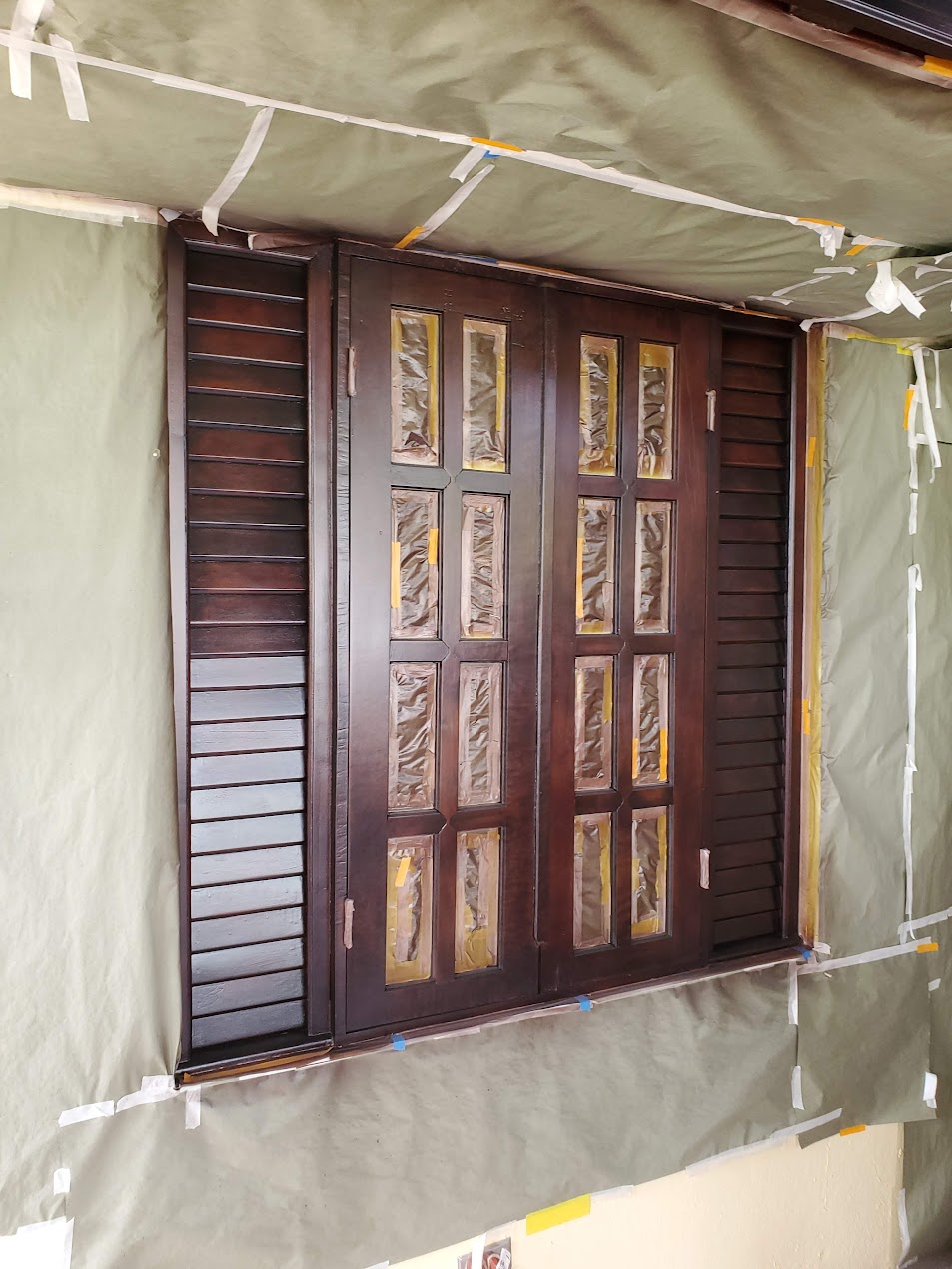 Custom wooden doors with decorative glass panels